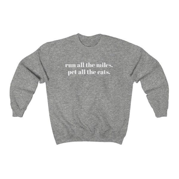 Run all the miles. Pet all the cats. – Unisex Sweatshirt