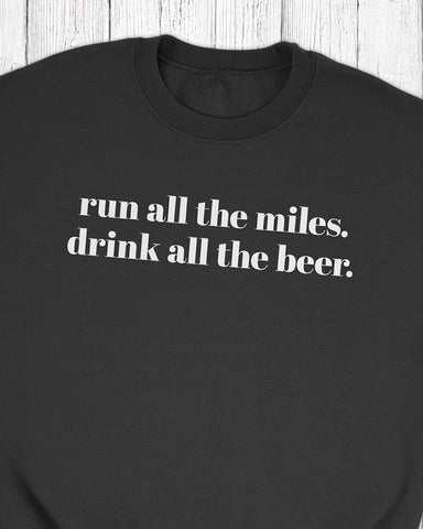 products/run-all-the-miles-drink-all-the-beer-black-sweatshirt-close-up.jpg